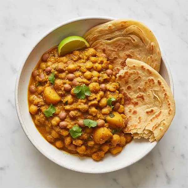 Trinidadian Channa And Pigeon Pea Aloo With Paratha Roti
